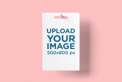 Mockup Featuring a Gift Card Hanging Against a Solid Color Backdrop 4071-el1