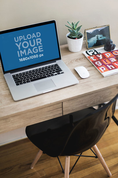 MacBook Mockup Featuring a Comfortable Home Office