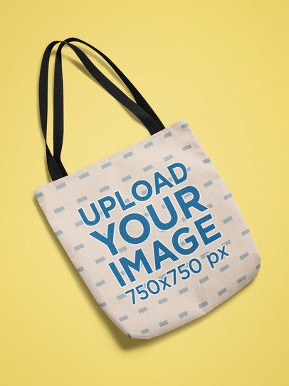 Mockup of a Tote Bag Featuring a Customizable Background