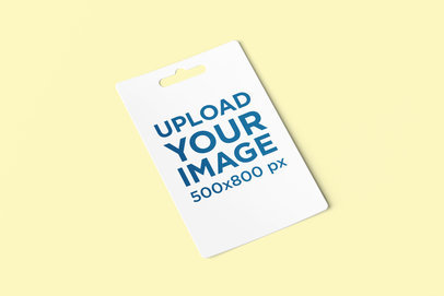 Mockup Featuring a Gift Card Placed Over a Solid Color Surface 4072-el1