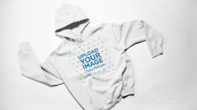 Stop Motion Video of Pullover Hoodies Being Tossed Into a Pile 13275