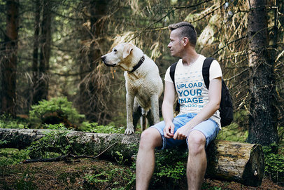 T-Shirt Mockup of a Man Hiking with His Dog
