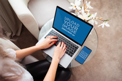 iPhone 11 Pro Mockup of a Woman Writing on a MacBook Pro 