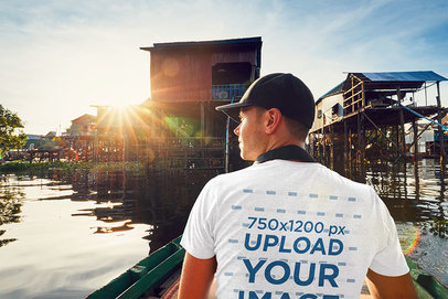 Back-View T-Shirt Mockup of a Man in a Canoe
