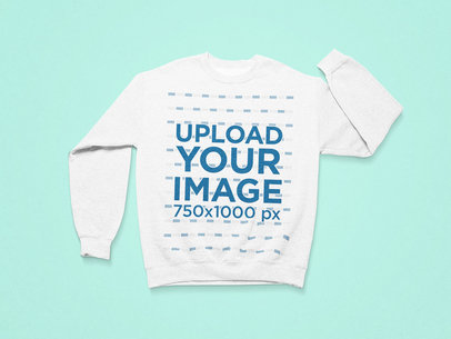 Mockup of a Crewneck Sweatshirt Laid Flat on a Customizable Surface