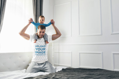 T-Shirt Mockup of a Father Carrying His Son on His Shoulders