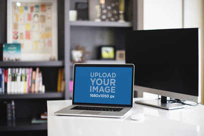 Mockup Featuring a MacBook Pro Placed on a Work Desk by a Bookshelf 
