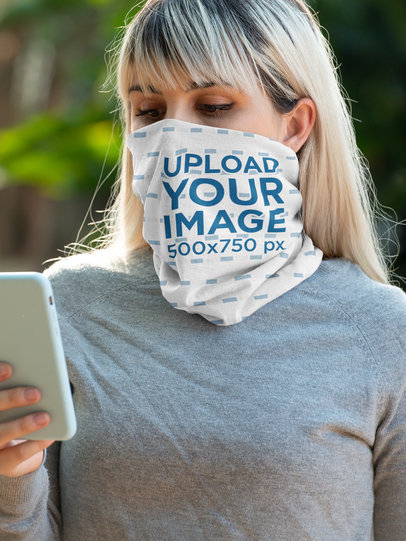Tubular Bandana Mockup of a Woman Checking Her Mobile