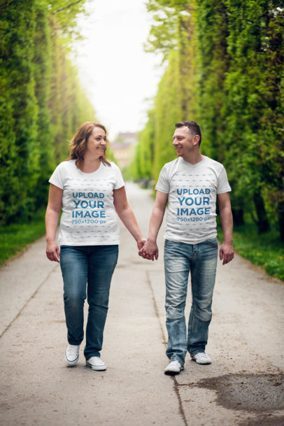 T-Shirt Mockup of an Adult Couple Holding Hands