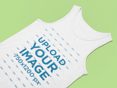Flat Laid Mockup of a Basic Tank Top Placed on a Plain Surface