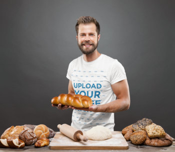 T-Shirt Mockup of a Baker Posing with Bread