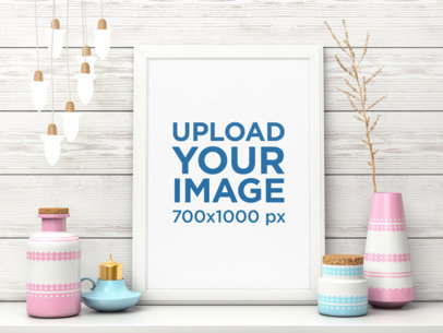 Mockup Featuring an Art Print Among Pastel-Colored Ceramic Vases 3970-el1