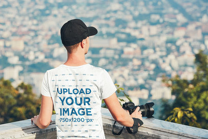 Back-View Mockup of a Man with a Tee Admiring a View