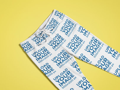Closeup Mockup of Sublimated Sweatpants on a Flat Surface 25335