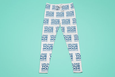 Mockup of a Pair of Sublimated Sweatpants Placed on a Plain Surface 25511