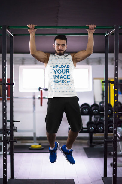 Sleeveless Shirt Mockup of a Man Doing Pull-ups at a Gym