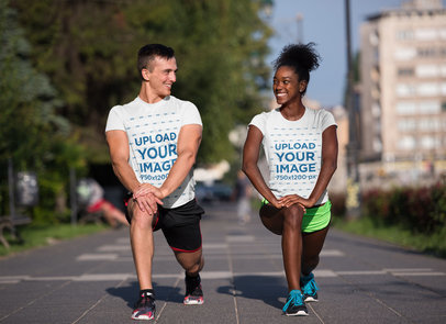 T-Shirt Mockup of a Couple Training on the Street