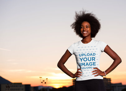 T-Shirt Mockup of a Woman with the Sunset as Background