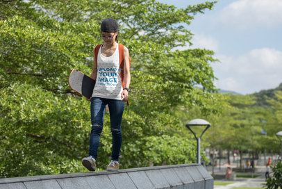 Tank Top Mockup of a Woman Walking with a Skateboard