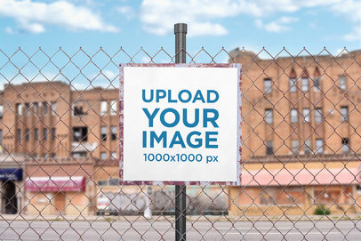 Mockup of a Sign Placed on a Fence