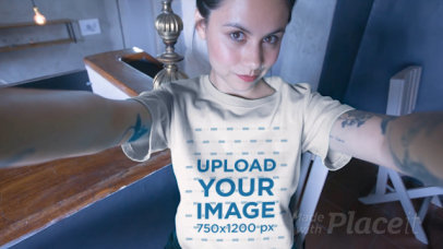 T-Shirt Video of a Woman Taking a Selfie on the Stairs  