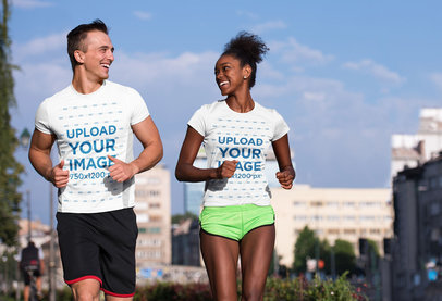 Mockup Featuring a Couple with Activewear T-Shirts Jogging Outside