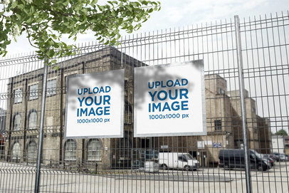 Mockup of Two Posters Hanging on a Wire Fence 