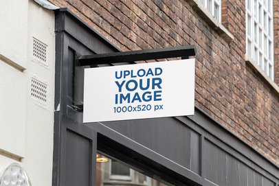 Mockup of an Outdoor Sign Placed on a Modern Store Facade 4109-el1