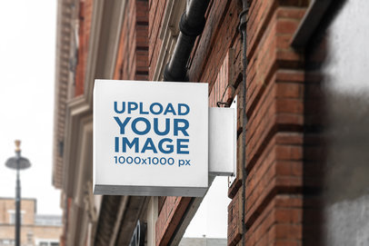 Outdoor Sign Mockup Featuring a Brick Facade 4110-el1