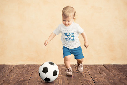 Mockup of a Boy with a T-Shirt Playing with a Soccer Ball