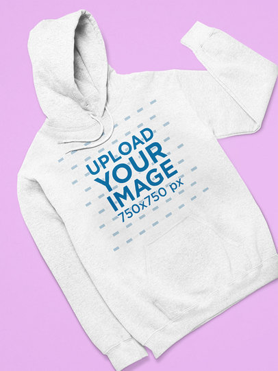Mockup of a Heathered Pullover Hoodie over a Customizable Flat Surface 25645