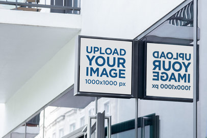 Mockup of a Squared Sign Beside a Glass Wall 4098-el1