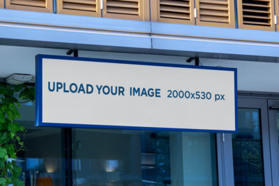 Mockup of a Large Horizontal Sign Hanging from a Wall 4099-el1