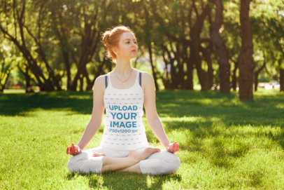 Tank Top Mockup of a Woman Doing Yoga on the Grass