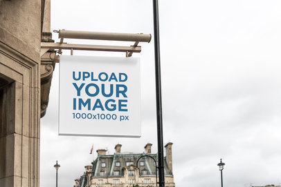 Sign Mockup Featuring European Buildings