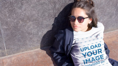 T-Shirt Video Featuring a Woman Playing on the Street