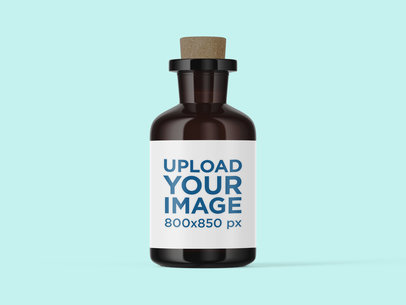 Amber Bottle Mockup With a Solid Color Backdrop 4212-el1