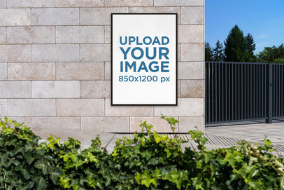 Mockup Featuring a Framed Poster Placed on a Granite Wall Outside a Building 4145-el1