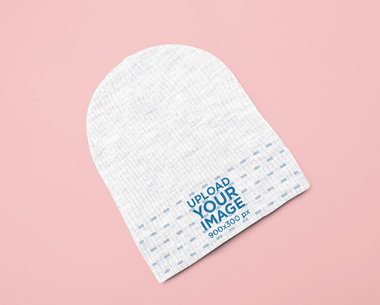 Garment Only Mockup of a Beanie on a Colored Surface