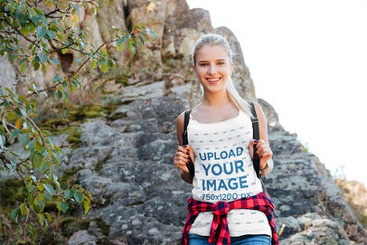 Tank Top Mockup of a Happy Woman Hiking at the Mountains 