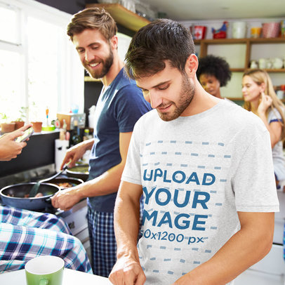 Tee Mockup of a Man Making Breakfast at the Kitchen with His Friends 34248-r-el2