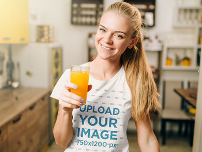 T-Shirt Mockup of a Woman Drinking Orange Juice