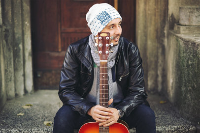 Mockup of a Guitarist Wearing a Beanie on a Cold Day 35144-r-el2