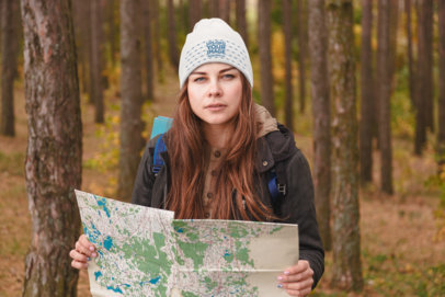 Beanie Mockup of a Woman at the Woods with a Map 34527-r-el2