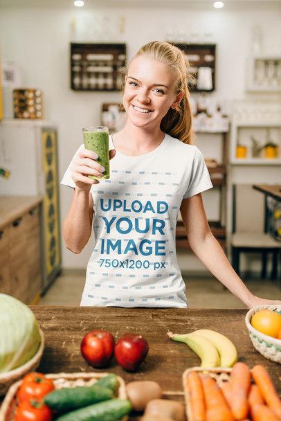T-Shirt Mockup of a Woman Drinking a Green Juice 