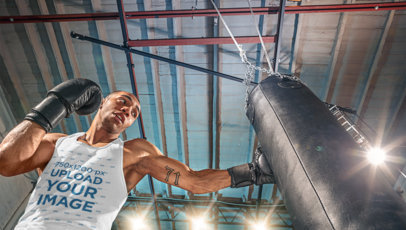 Tank Top Mockup of a Man Training with a Boxing Bag