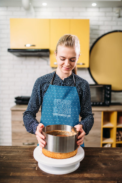 Apron Mockup of a Woman Making a Cake