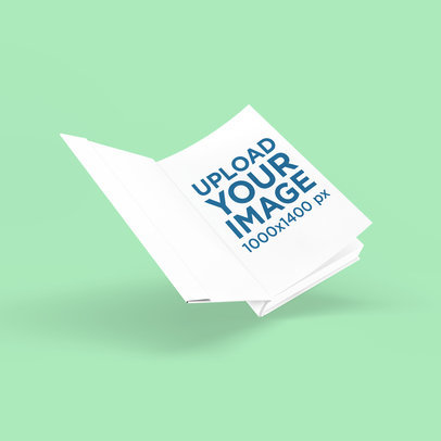 Mockup Featuring an Open Hardcover Book Floating 