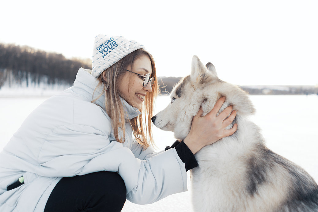 Beanie Mockup of a Woman Petting Her Husky