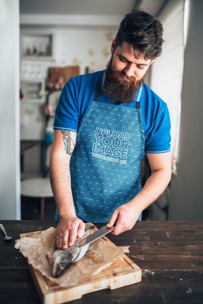 Apron Mockup Featuring a Man Slicing a Fish